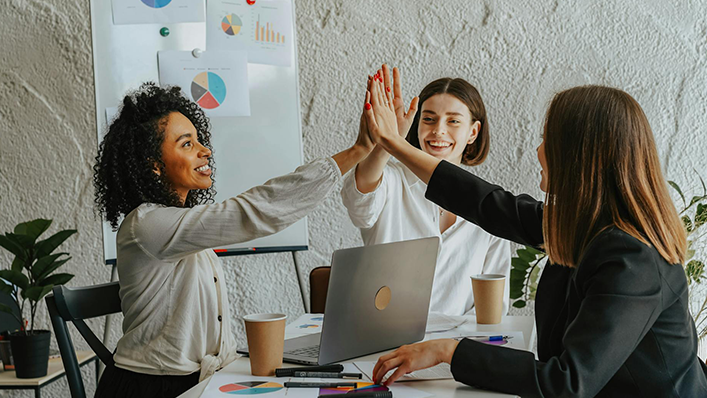 Work team high fiving