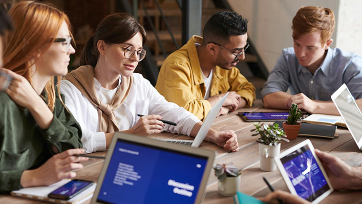 Team conducting a work meeting